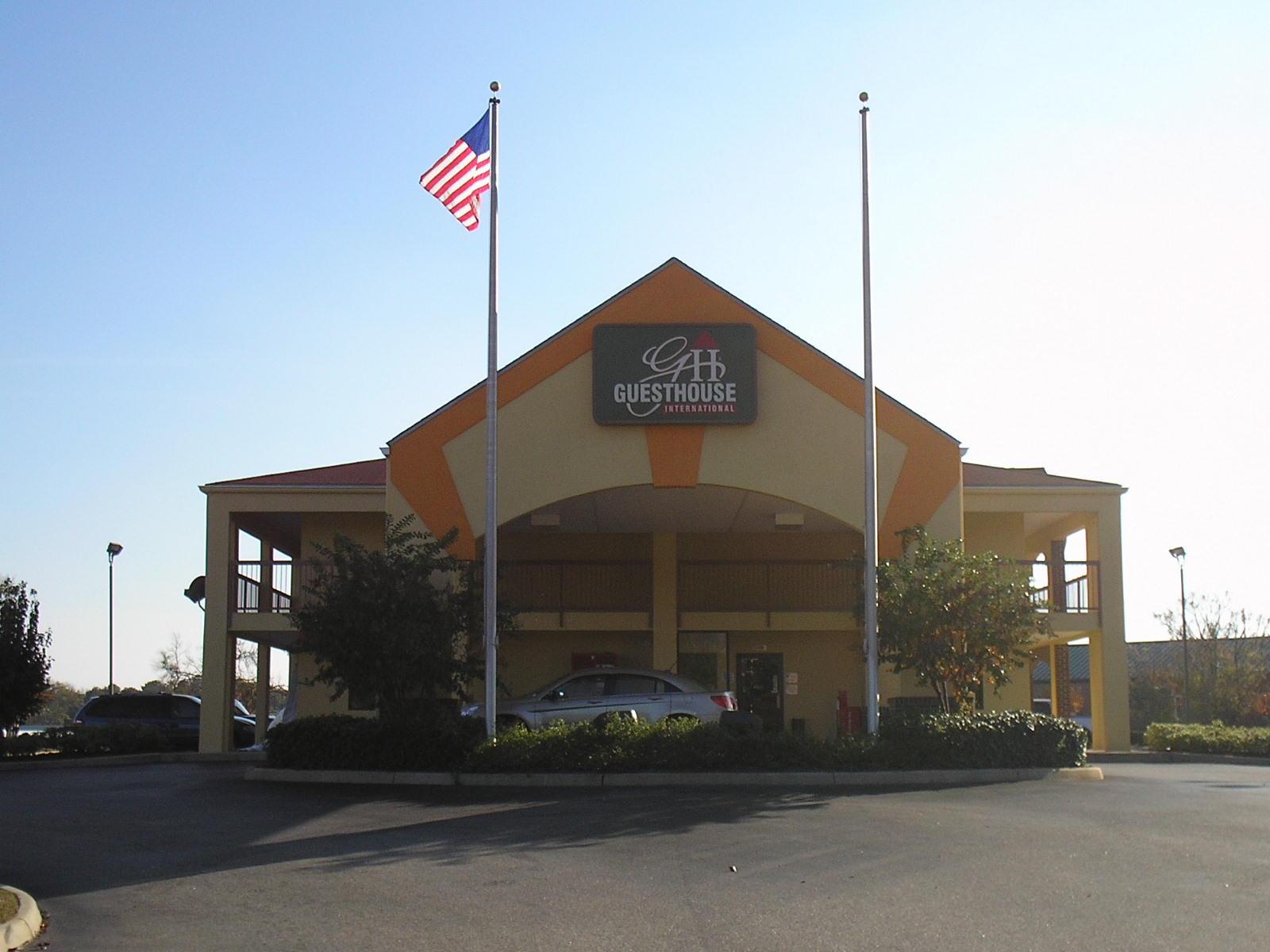 Hotel exterior front entrance with American Flag
