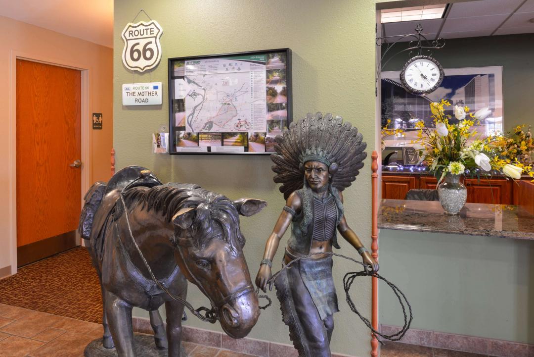 Front desk with Native Indian statue and horse