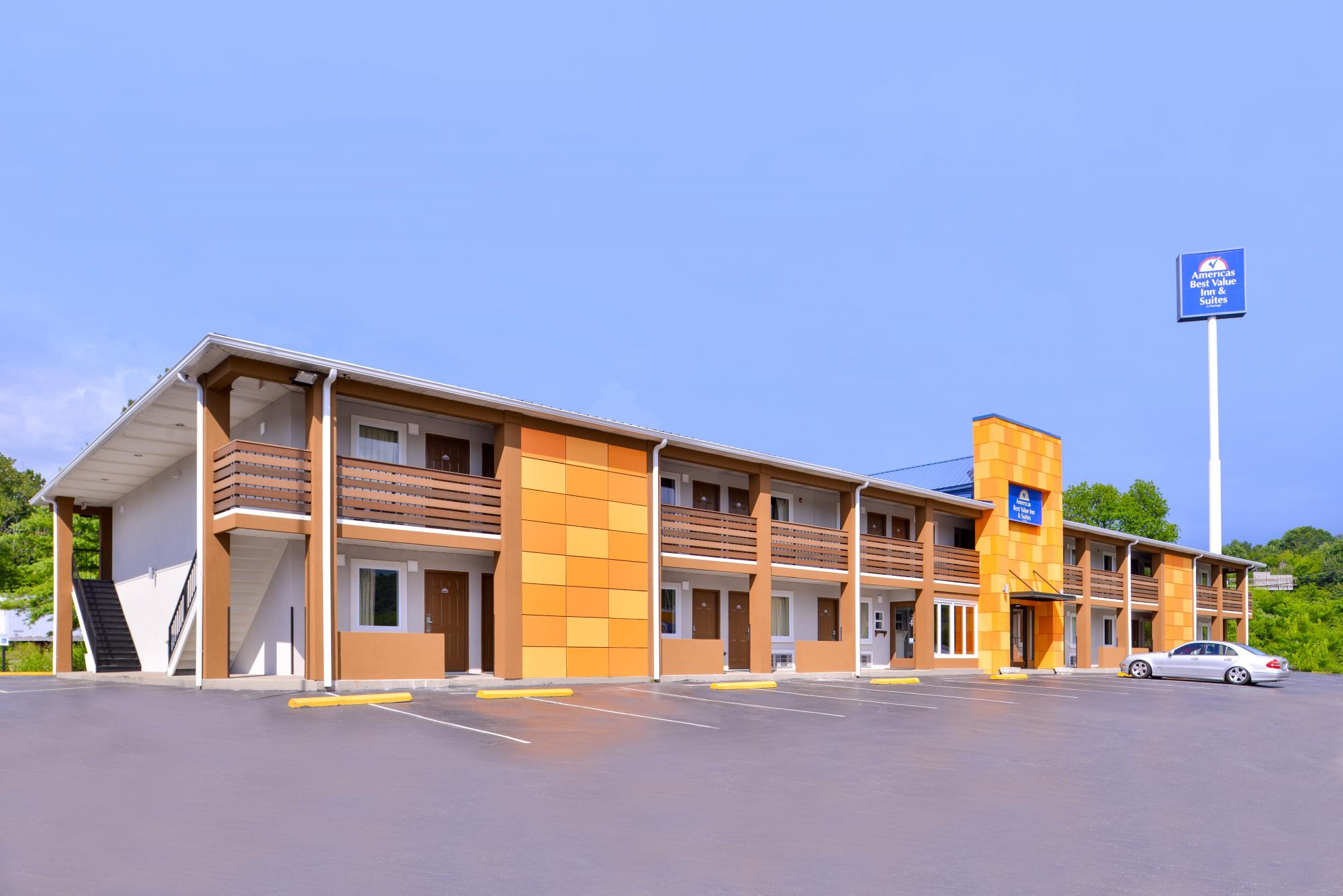 Hotel exterior and parking lot with main lobby entrance