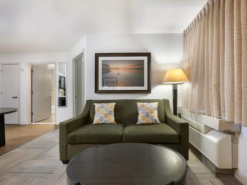 The living area of the One Bedroom Suite at Sonesta Simply Suites Huntsville Research Park.