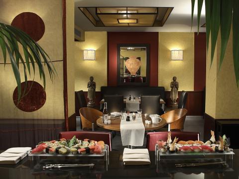  The interior of the Sushi Ya restaurant with Sushi displayed on a table at Sonesta Hotel, Tower & Casino - Cairo.