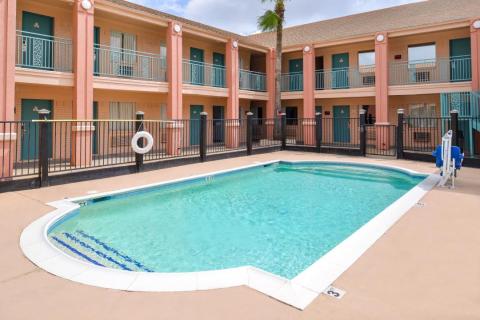 Outdoor pool with handicap accessible lift in center courtyard